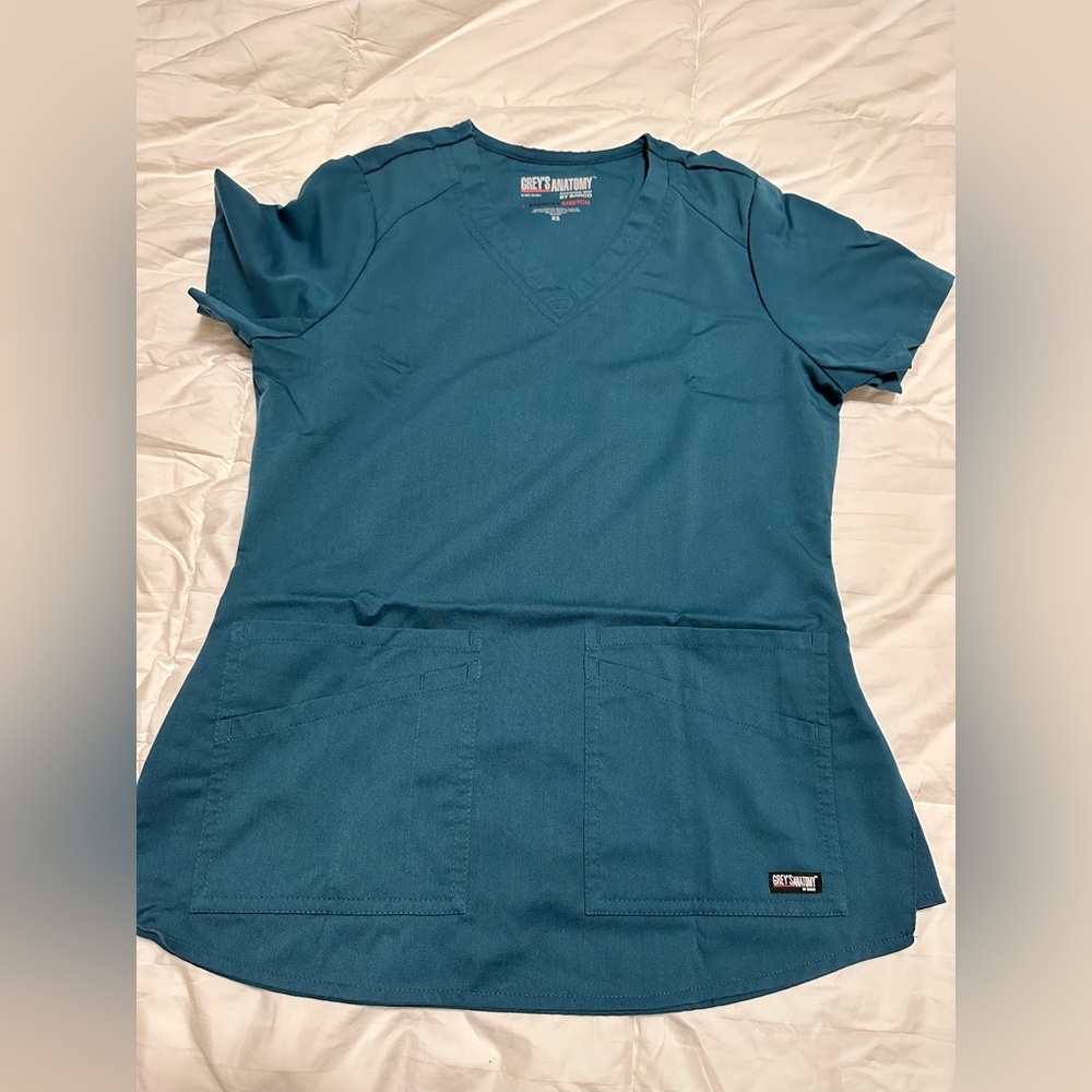 Greys anatomy by Barco Active Stretch+ scrub top. Carribbean Blue XS